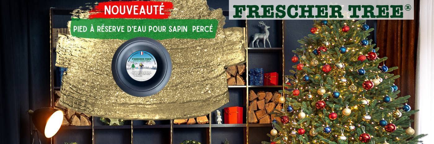 Un sapin de noël bien hydraté grâce à son support à réserve d'eau intégrée